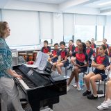 Elementary ʮ.cc American School music class